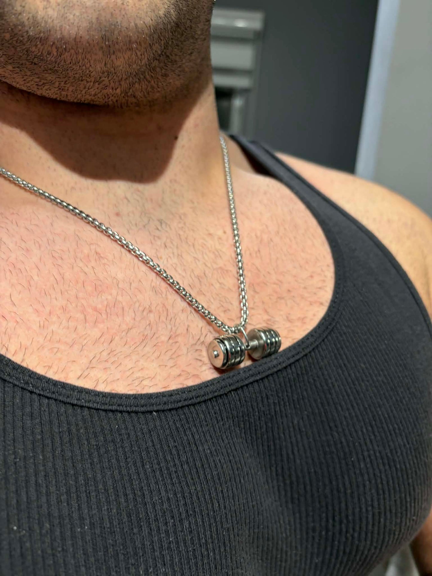 Collier gros haltère